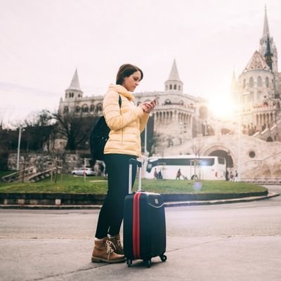 Solo traveller with a suitcase